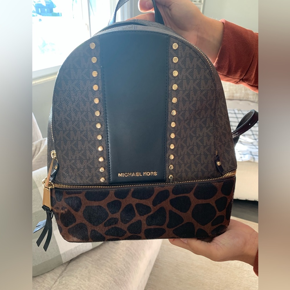 Michael Kors cheetah backpack purse! In great condition